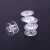 Import Clear Empty Bobbins Plastic Spools for Sewing Machine Sewing Threads Empty Bobbins Home Sewing Accessories from China