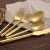 Import European western restaurant  tableware set golden solid steak high quality round handle knife and fork set for wedding from China