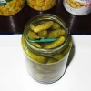 Fresh canned pickled cucumber in glass canned food