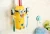 Import Home Bathroom Products Cute Design Set Cartoon yellow Toothbrush Holder Automatic Toothpaste Dispenser Toothpaste from China