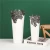 Import Modern luxury silver plating hotel decorative item ceramic vases for home decor from China