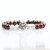 Import natural stone beads jewelry lava volcanic custom logo lion bracelet men from China