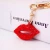 Import newest dropshipping cheap epoxy cute epoxy rhinestone lip gloss chain KISS crystal lipgloss keychain for women luxury jewelry from China