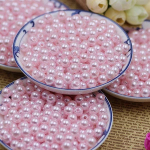 Pearl plastic beads in loose