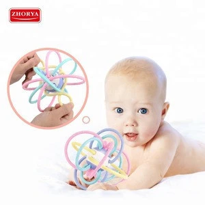 Soft glue hand grabbing rattles water boiled baby ball teether