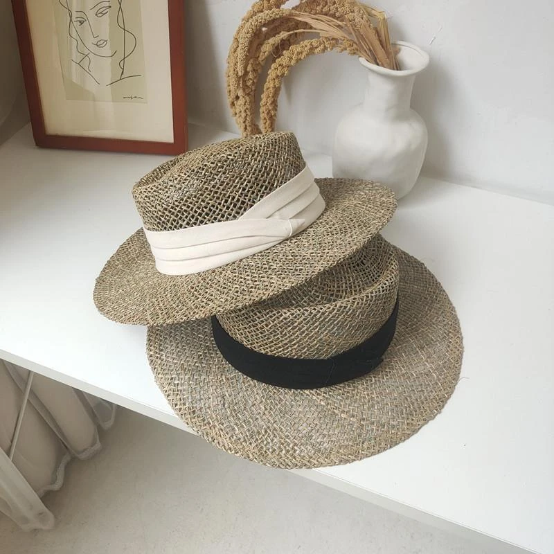 Travel Natural seagrass hollow flat brim hat ladies summer porkpie concave round sun straw hat with ribbon