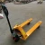 Import wholesale material handling equipment 1.5 ton small pallet truck from China