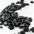 Import wholesale Polished black river stone pebble for garden decoration from China