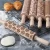 Import Wooden rolling pin carved embossed rolling pin cookie dough stick crafts for kitchen from China