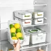 Clear fridge fresh box with colander inside