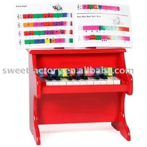 18 keys wooden piano with song book