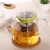 Import Cheap Borosilicate glass tea pots with stainless steel tea strainer from China