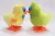 Import Chinese gift items colorful cartoon chicken toy plastic with plush wind up jumping chick toy from China