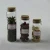 Import Different Sizes Clear Round Laboratory Sample Reagent Glass Bottle with Cork Lid from China