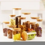 Home usage clear glass spice jar eco-friendly durable glass hermetic glass storage jars with wooden lid