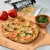 Import Hot sale cheese board serving tray wood pizza peel pizza paddle bamboo pizza tray with hanging hole from China