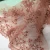 Import new  peach lace tulle fabric net embroidery fabric design handmade beaded sequin lace fabric for dress or bridal from China