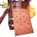 Wooden kids indoor rock climbing wall with rock climbing holds