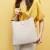 Import 2020 wholesale fashion online shopping travelling lady shoulder genuine leather Bucket bag handbag for women from China