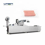 Auto vacuum thermoforming packaging machine for meat sausage, over 2000 pks per hour