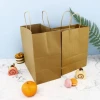 Hot selling  5kg Factory High Quality Cheap Kraft Paper Bags Carrying Bag Print with Handles