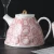 Import Japanese style large embossing surface ceramic teapot decorative tableware red line pad printing coffee porcelain tea pot from China