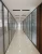 Import RG84 Custom Design Modern Aluminum Metal Windproof Durable Glass Door Office Partition Glass Wall from China