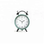 Round metal standing clock alarm clock