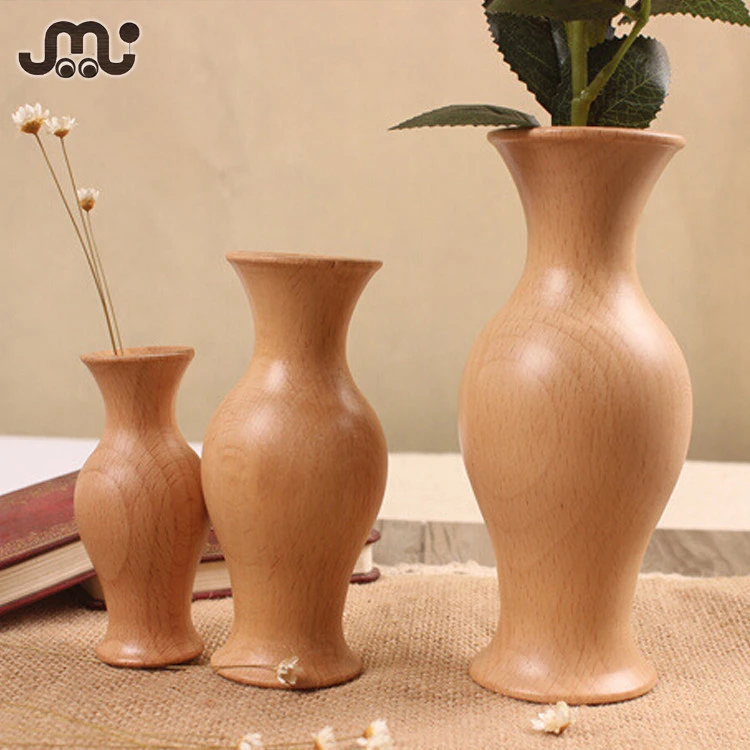 Small polished natural wooden decoration vase