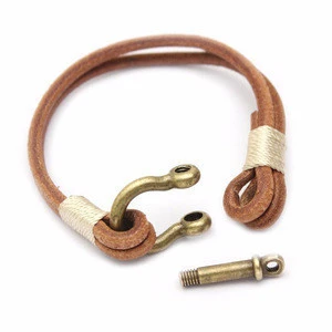 Vintage unisex handmade horseshoe buckle braided leather bracelet