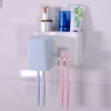 Wholesale automatic toothpaste dispenser toothbrush holder Set