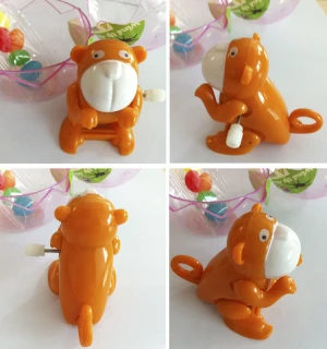 Wind up plastic monkey surprise egg toy candy with toys