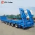 Import China 3 axles 4 axles heavy duty low deck truck semi lowboy trailer from China