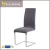 Import Chrome Gloss Pu Living Room Metal Leg Black Leather Dining Chair from China