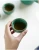 Import New Japanese Style Black Green White Stoneware Simple Handmade Puer Tea Cup Bowl from China