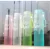 Import Portable borosilicate glass drinking water bottle with silicone sleeve from China