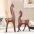 Import White Gold Color Modern Horses Design Handmade Resin Sculpture from China