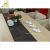 Import Wholesale customized black plastic pvc woven fabric wedding table runner with printed brown tree patterns from China