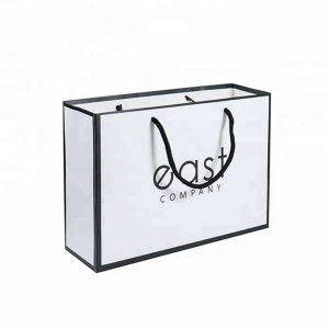 Wholesale brand logo printing gold foil custom paper gift bags with handle string