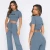 Import Wholesale Latest Basic Loungewear Set Women Crop Top High Drawstring Waistband Flare Legs Ribbed Pants Ladies 2 Piece O from China