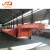 Import 3 axle 60 tons 80 tons lowboy excavator transport trailer 4 axles 100 tons heavy duty gooseneck low bed semi trailer from China