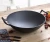 Import Chinese Traditional Pre-seasoned Non-stick Cast Iron Wok Pan With Wooden Lid from China