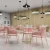 Import European style wholesale milk tea shop restaurant cafeteria gold metal tables and chairs from China