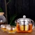 Import Heat-resistant stainless steel filter colored handles flower tea pot sets from China