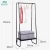 Import Industrial Coat Clothes Clothing Rack Tier Shoes Bench Steel Retail Display Stand With Coat Hook Hanger from China