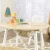 Import New Design Natural Wood White Round Children Kids Storage Table and Chair Set from China