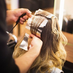 Hair aluminum foil highlights using hairdressing foil roll or sheet