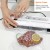 Import Handheld Vacuum Sealer With Built-in Cutter and BPA Free Vacuum Bags for Food Packaging and Sous Vide Cooking from China