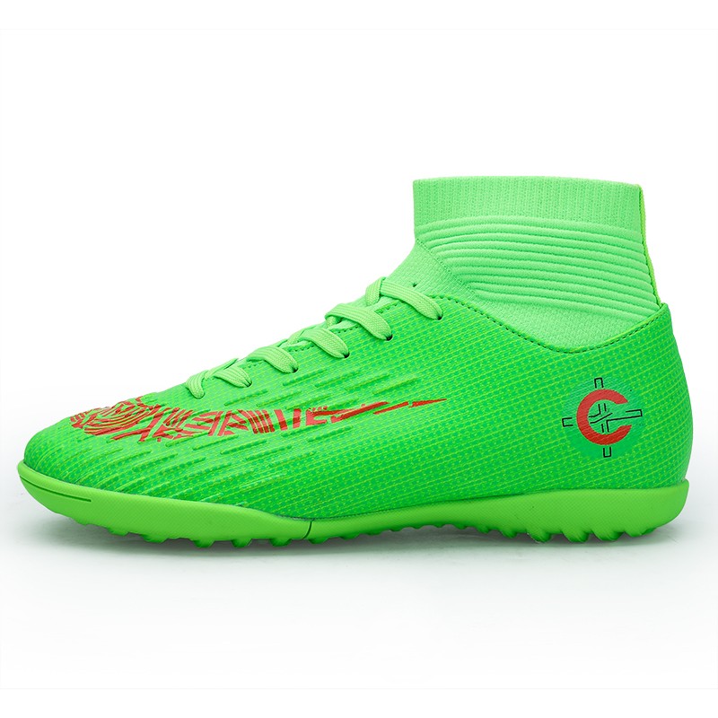 Hot outdoor grass children&#39;s soccer shoes stilts foot CR7 sports football shoes