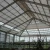 Import Large-scale production tunnel glass greenhouse for sale from China
